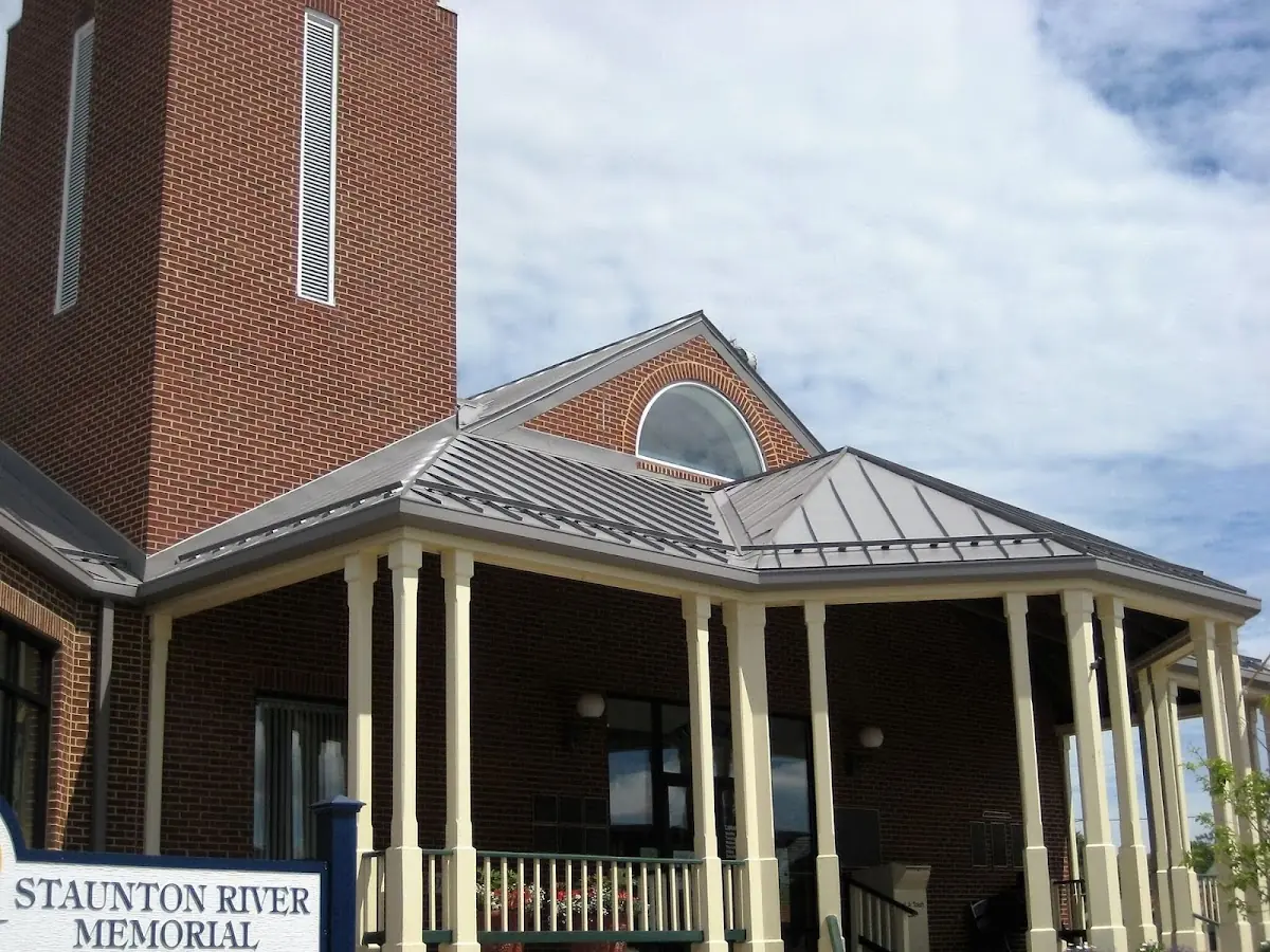 Skilled roofing craftsmen working on a residential roof in Pickwick